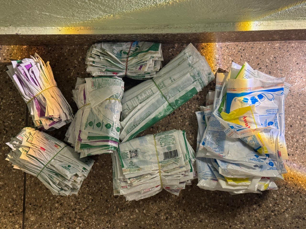 Bundled milk pouches sorted for recycling