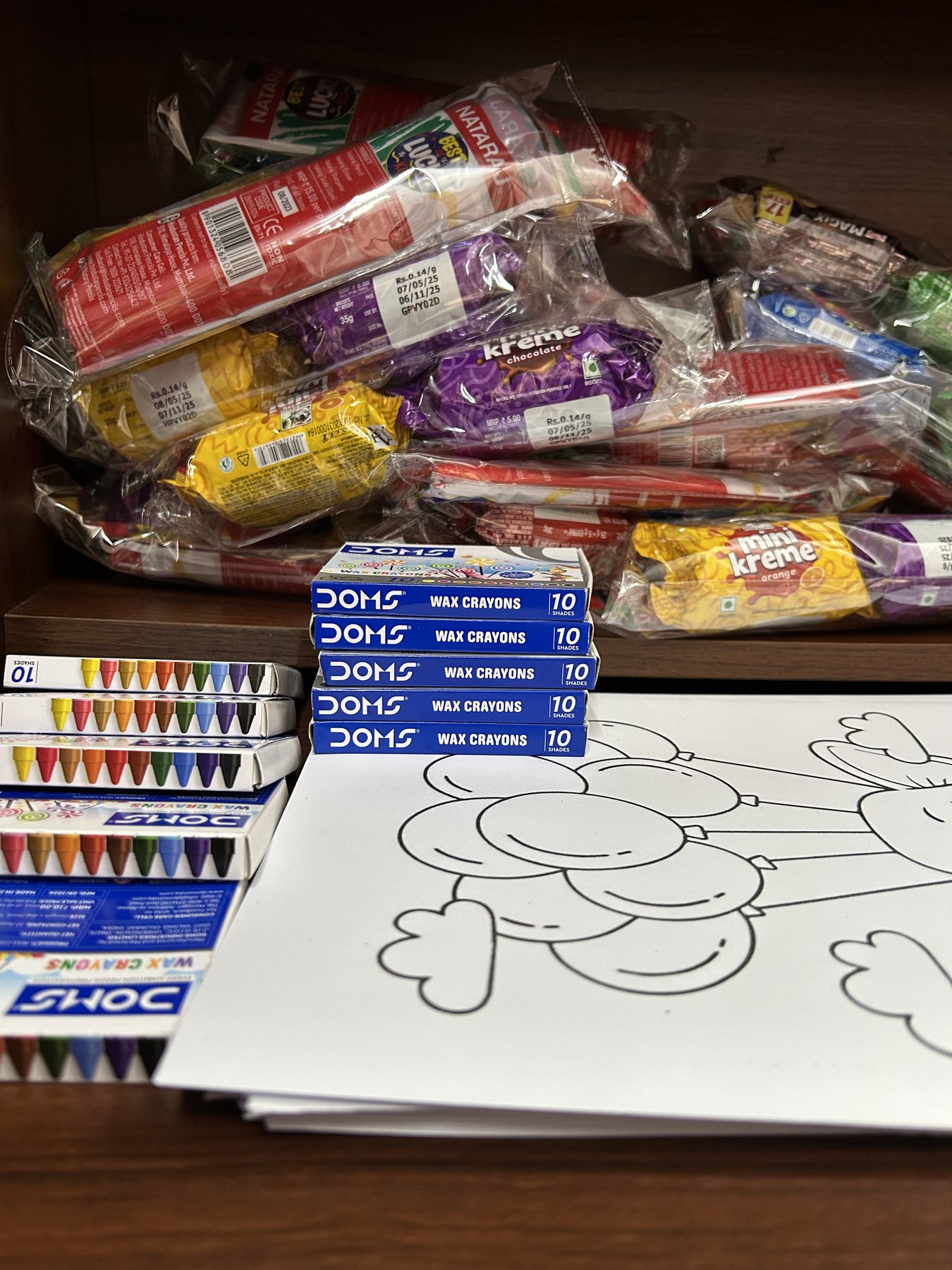 Children with their colouring sheets