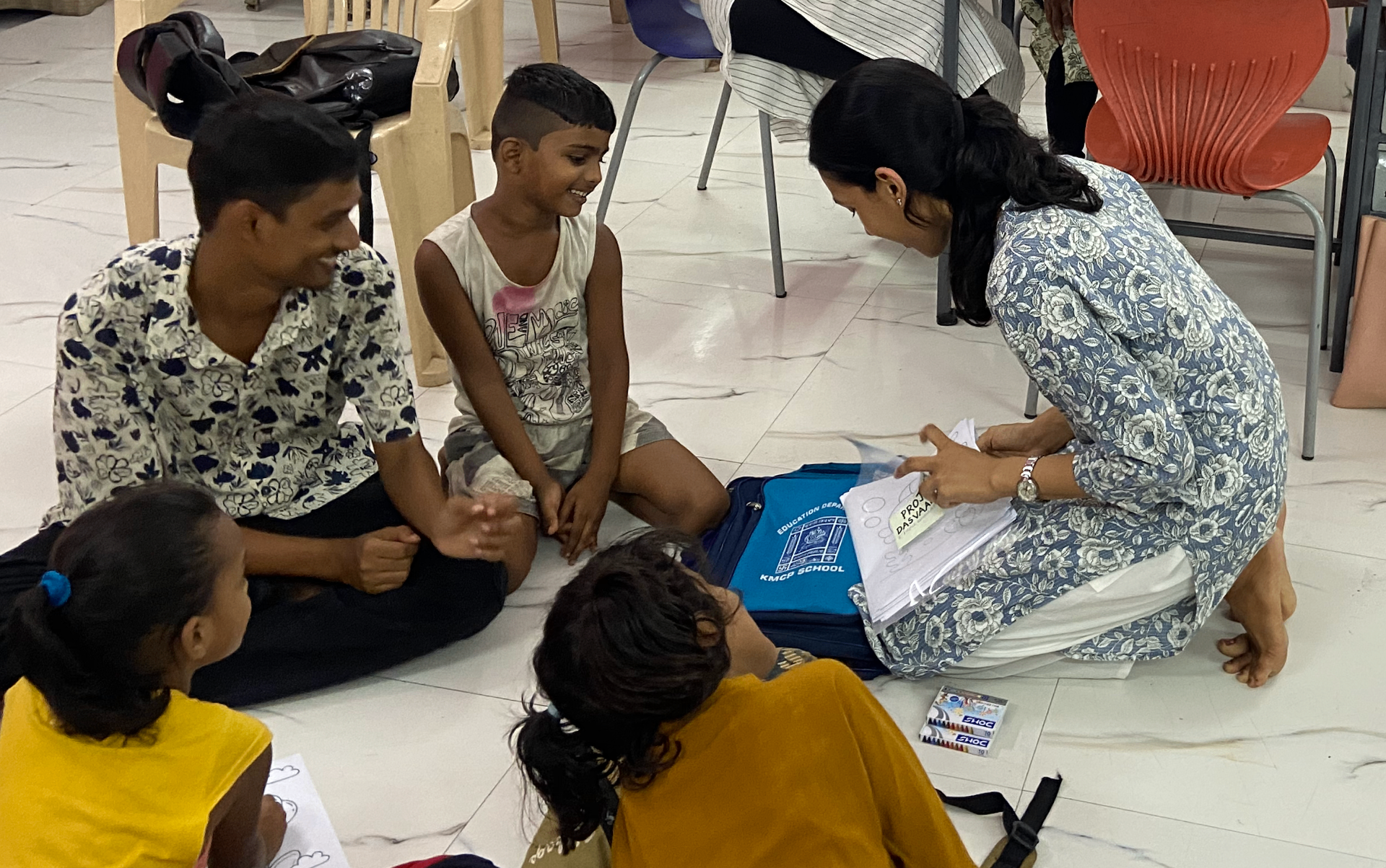 Volunteer engaging with children at Purnata